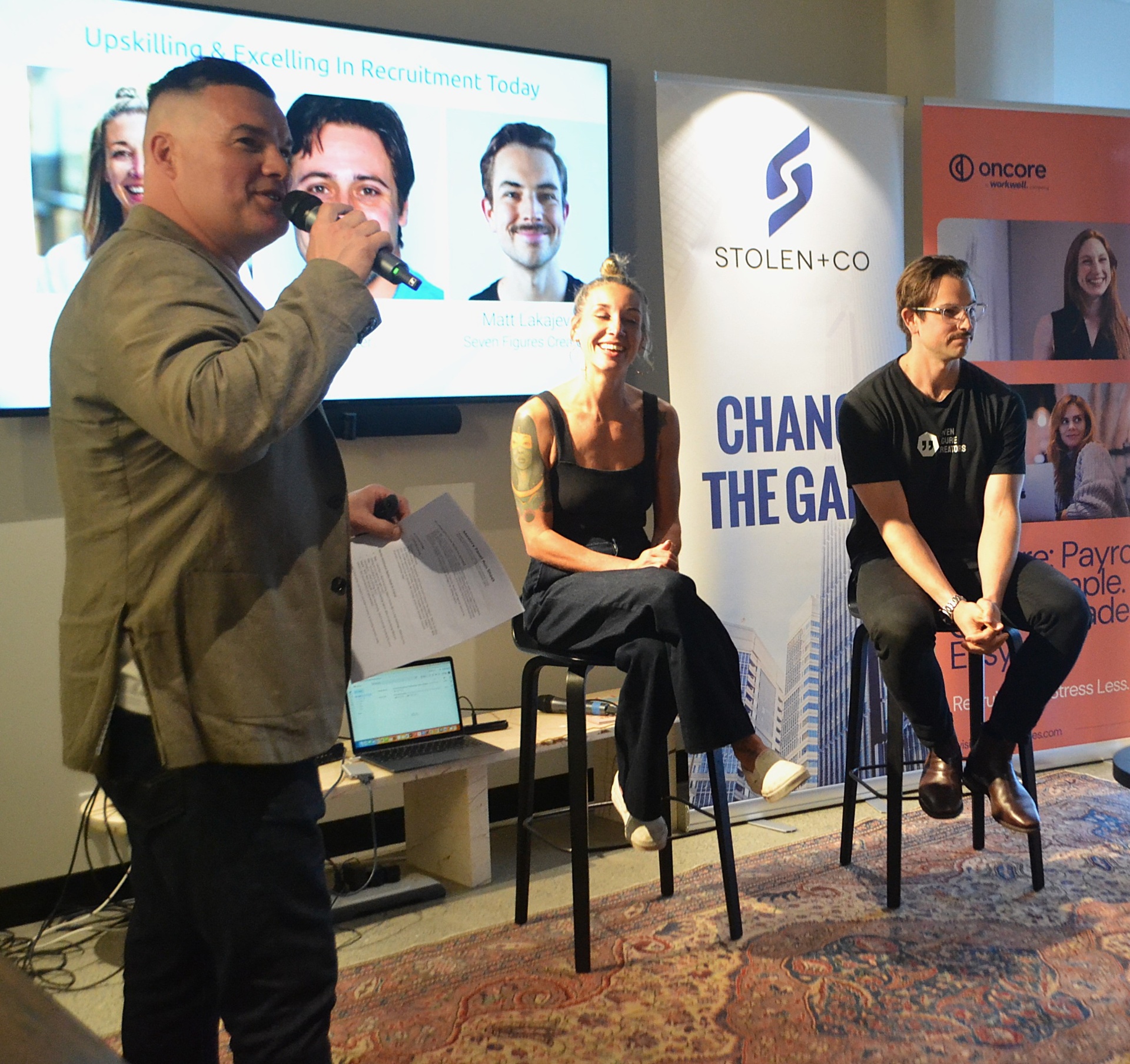 Steve hosting a Change the Game event panel in Sydney
